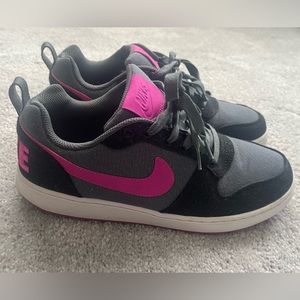 Black, gray and fuschia Nike Air Force 1 Lows.